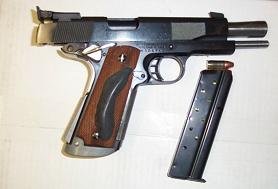 9mm springfield 1911 right side action open.JPG
