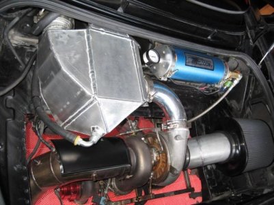 GT45R turbo, water intercooler and Accusump in the trunk.jpg