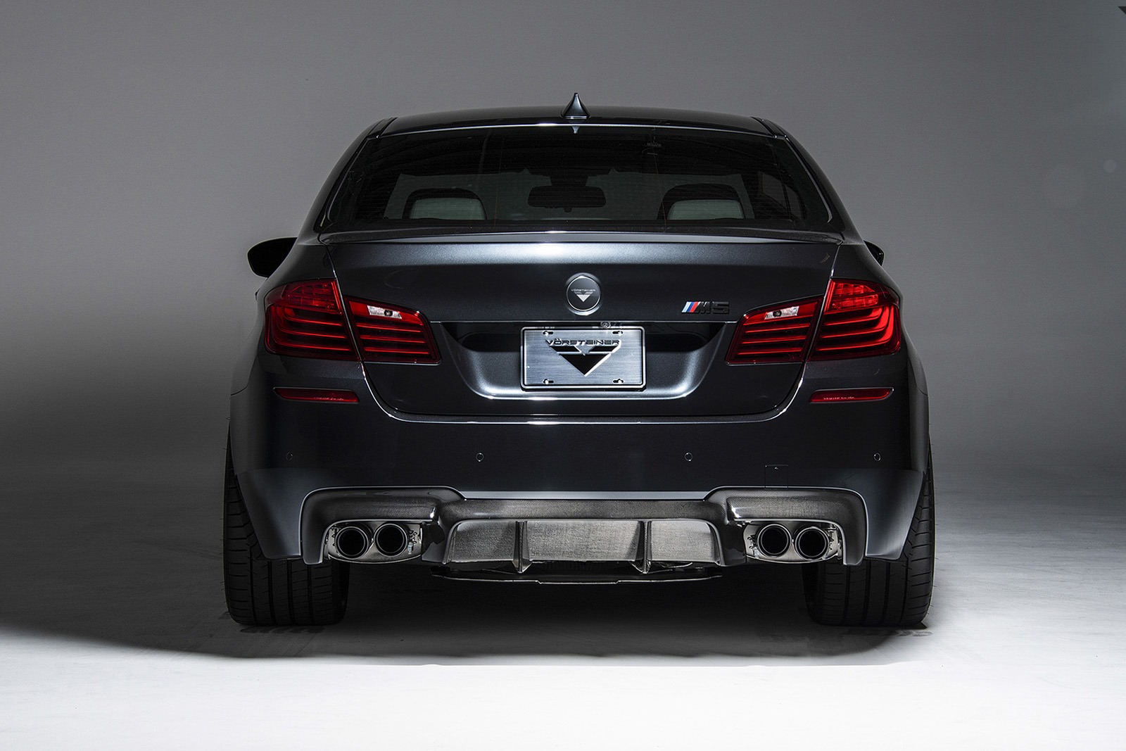 2014-BMW-M5-by-Vorsteiner-rear.jpg