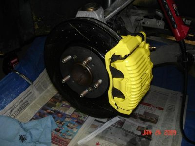 coated front caliper and new rotor instatted no wheel (2).jpg