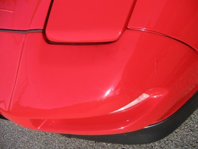 left front bumper crack.jpg