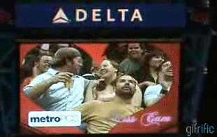 Kiss-Cam-Beer-Spills-on-Fan.gif