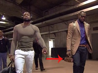 what-the-heck-was-lebron-james-carrying-in-that-tiny-purse-he-brought-to-the-game-yesterday.jpg